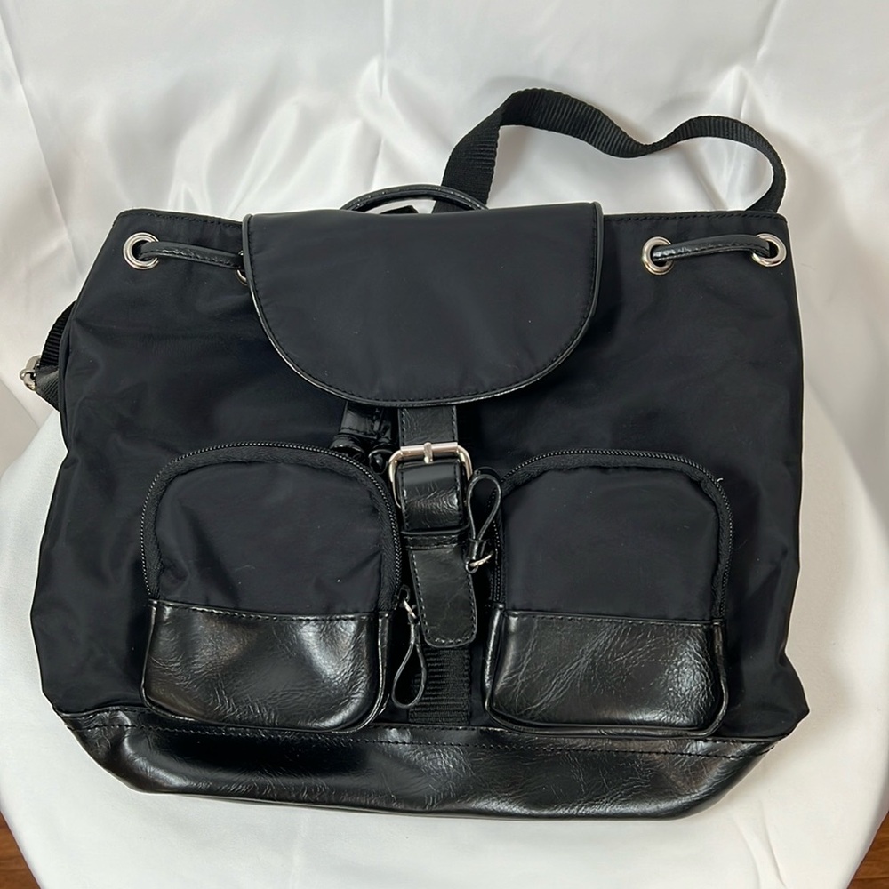 Nine & Co. by Nine West black backpack bag.